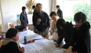 项目官员深入一线 在学习中成长